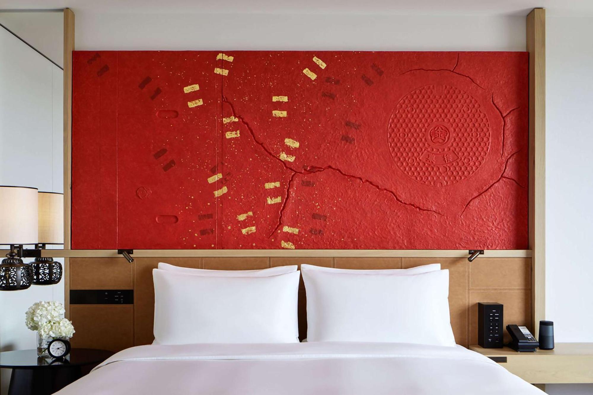 Hyatt Centric كانازاوَ المظهر الخارجي الصورة A bed with a headboard